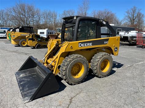 john deere 320 skid steer backhoe attachments|jd skid steer attachments.